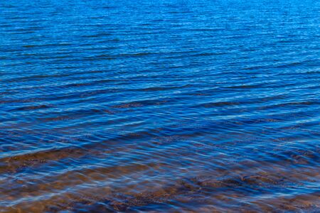 Water texture background. Surface of the river