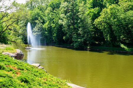 View of a lake with Snake Fountain in Sofiyivka park in Uman, Ukraineの写真素材
