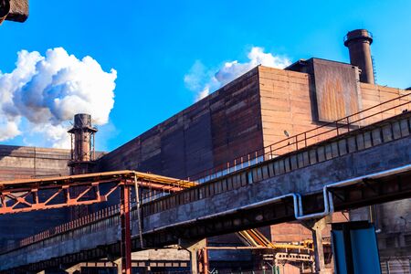 View of old factory with pipe with smoke. Air pollution, environmental damageの写真素材