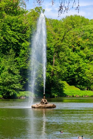 View of a lake with Snake Fountain in Sofiyivka park in Uman, Ukraineの写真素材