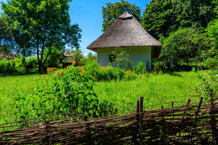 Ancient traditional ukrainian rural house in Pyrohiv (Pirogovo) village near Kiev, Ukraineの写真素材