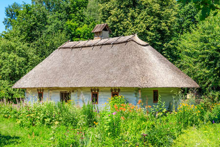 Ancient traditional ukrainian rural house in Pyrohiv (Pirogovo) village near Kiev, Ukraineの写真素材