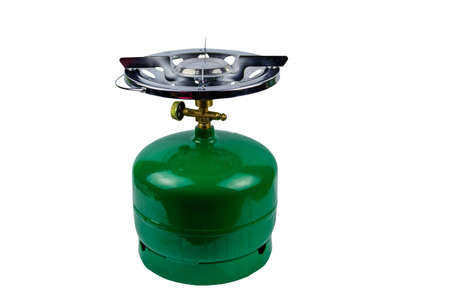 Green propane gas cylinder with burner isolated on white backgroundの写真素材