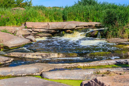 View of Tokovsky waterfalls on the Kamenka river in Dnipropetrovsk region, Ukraine