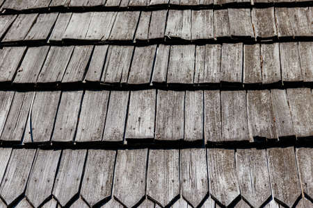 Background of the old wooden shingles roof