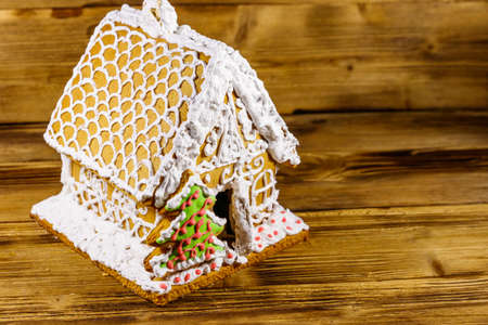 Christmas Gingerbread house on a wooden tableの写真素材