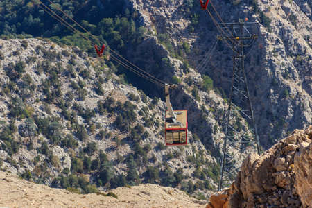 Cable car on ropeway leading to a top of Tahtali mountain in Antalya province, Turkeyの写真素材