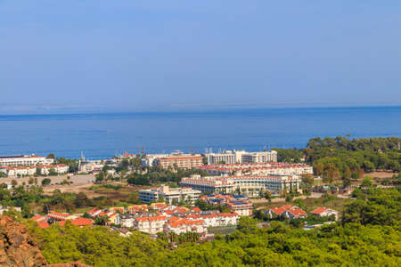 View of Kemer town on a coast of the Mediterranean sea in Antalya province, Turkey. Turkish Riviera. View from a mountainのeditorial素材