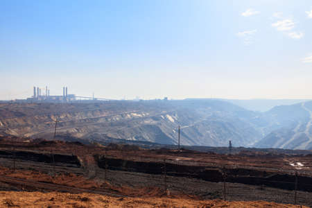 View of the iron ore quarry in morning haze