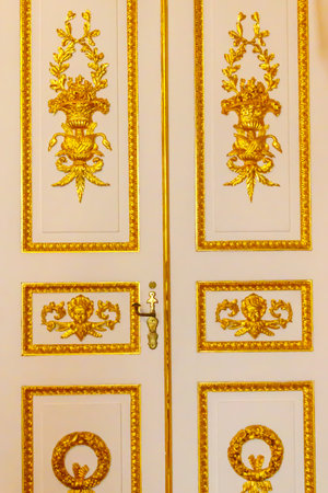 Close-up of a gilded ornate doorの写真素材