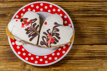 Heart shaped cookies on wooden table. Top view. Dessert for valentine dayの写真素材