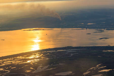 Aerial view of the Dnieper river and factory chimneys near Kiev, Ukraine