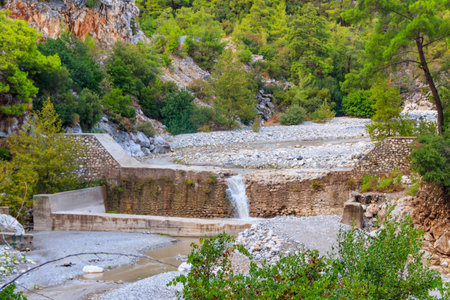 Small waterfall on mountain river in Kesme Bogaz canyon, Antalya province in Turkeyの写真素材