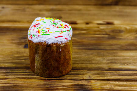 Easter cake on a rustic wooden tableの写真素材
