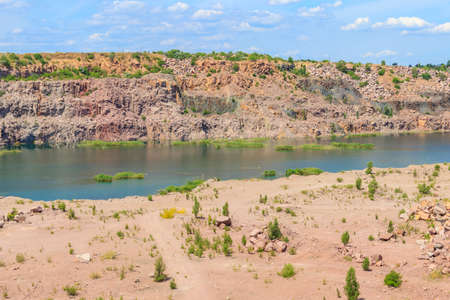 View of the lake at abandoned quarry on summer