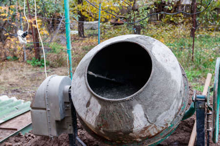 Mixing of concrete in the concrete mixer at construction siteの写真素材