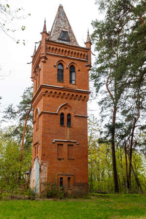 Old brick water tower in Natalyevka park in Kharkiv region, Ukraineの写真素材