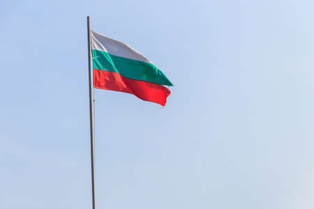 Waving flag of Bulgaria against blue skyの写真素材
