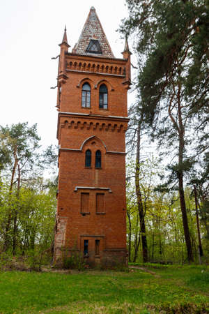 Old brick water tower in Natalyevka park in Kharkiv region, Ukraineの写真素材