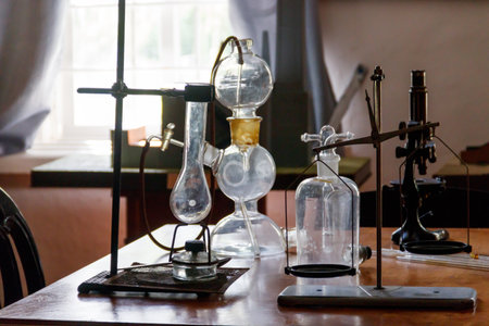 Flasks and chemical equipment in old laboratoryの写真素材