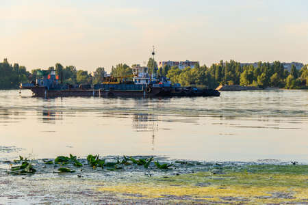 Industrial ship on the Dnieper river in Kremenchug, Ukraineの写真素材