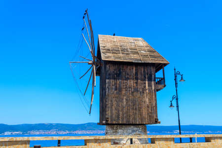 Old wooden windmill in the old town of Nessebar, Bulgariaの写真素材