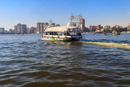 Cairo, Egypt - December 8, 2018: Pleasure boat on sailing down the Nile river in Cairo, Egyptのeditorial素材
