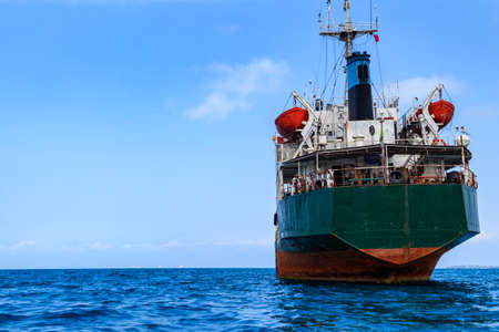 Large industrial ship sailing in the Indian ocean near Zanzibar, Tanzaniaの写真素材