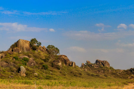 View of the kopje rocks in endless savannah in Serengeti National Park, Tanzaniaの写真素材