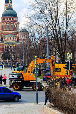 Kharkov, Ukraine - April 5, 2021: Repair of road surface in the center of Kharkiv, Ukraineのeditorial素材