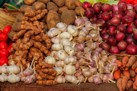 Variety of vegetables on a stall in the street marketの写真素材