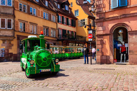 Colmar, France - May 8, 2022: Tourist train riding around the old town of Colmar, Franceのeditorial素材