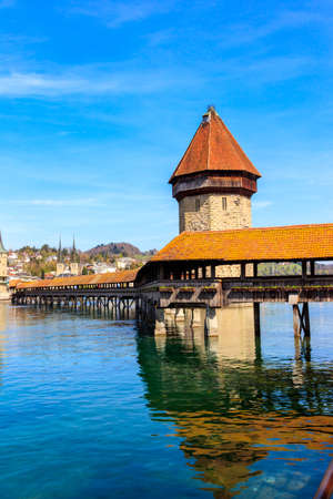Chapel bridge spanning the river Reuss in the city of Lucerne, Switzerlandの写真素材