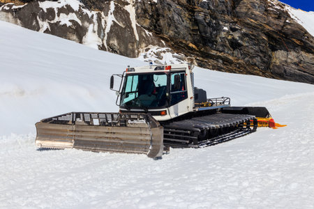 Snowcat, machine for snow removal, preparation for ski trails, snow groomerの写真素材