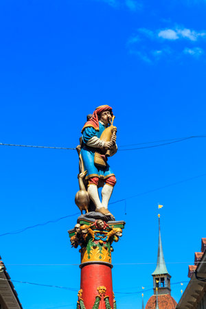 Piper Fountain (Pfeiferbrunnen) in the old city of Bern, Switzerland. The fountain was built in...