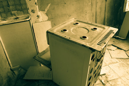 Kitchen of abandoned apartment in the ghost town Pripyat in Chernobyl Exclusion Zone, Ukraine. Black and white toneの写真素材