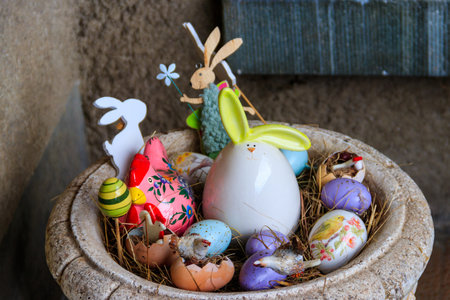 Easter decoration with Easter eggs and Easter bunnies in a pot