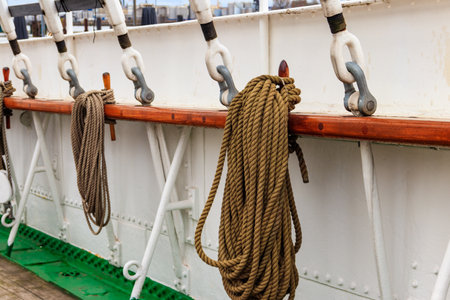 Nautical ropes on a deck of a large shipの写真素材