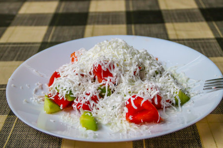 Traditional Bulgarian Shopska salad on a tableの写真素材