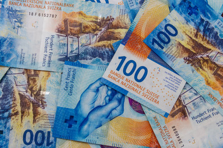 Background of one hundred swiss francs banknotesの写真素材