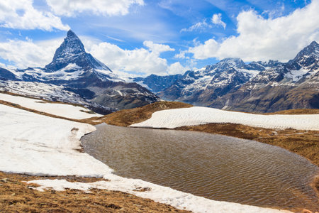 View of the Matterhorn with mountain lake near Zermatt in Valais canton, Switzerlandの写真素材