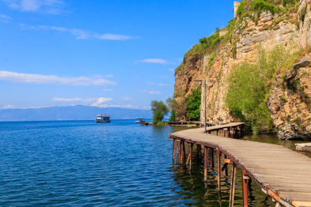 The wooden Bridge of Wishes along the Ohrid lake in Ohrid, North Macedoniaの写真素材