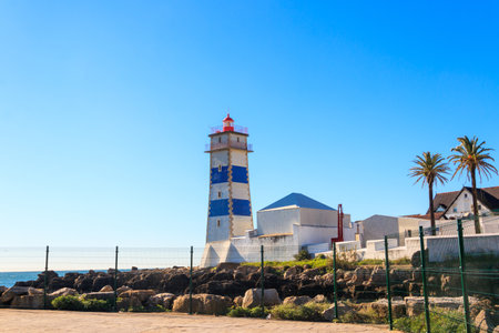 Santa Marta lighthouse in Cascais Portugal. Atlantic Ocean coastの写真素材