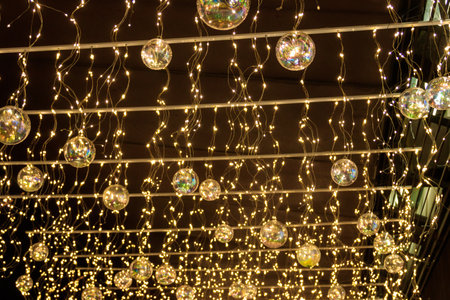 Christmas lights on a city streets. Christmas urban decorationsの写真素材