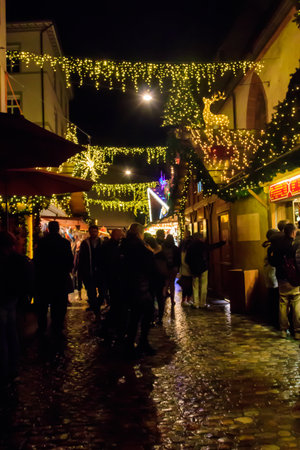 Basel, Switzerland - December 21, 2022: People visiting traditional Christmas market in Basel, Switzerlandのeditorial素材