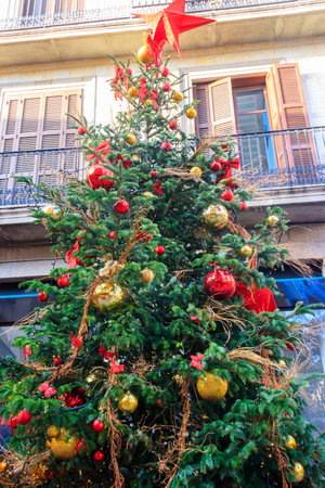 Beautiful decorated Christmas tree at Christmas marketの写真素材
