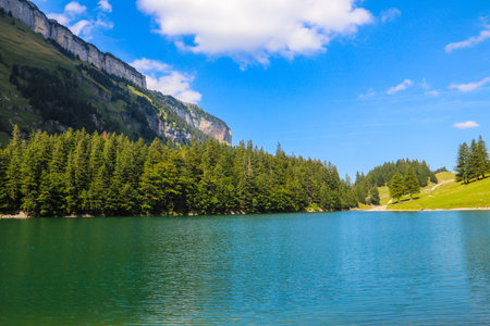 View of Lake Seealpsee near Appenzell in the Alpstein mountain range, Ebenalp, Switzerlandの写真素材