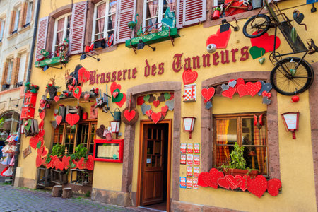 Colmar, France - May 8, 2022: Decorated old medieval building in Colmar, Alsace, Franceのeditorial素材