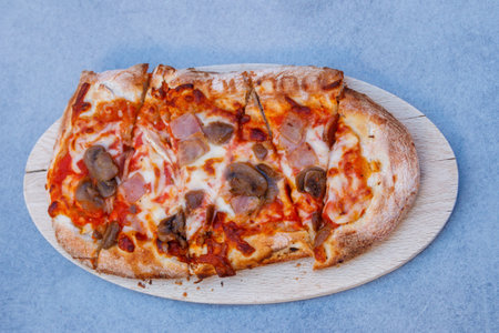Tasty pinsa on a table. Top viewの写真素材