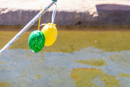 Festive decorations for Easter holiday on the fountain in Nyon, Switzerlandの写真素材